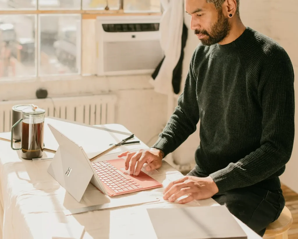 Entrepreneur working on a laptop, illustrating how to form an LLC in Florida